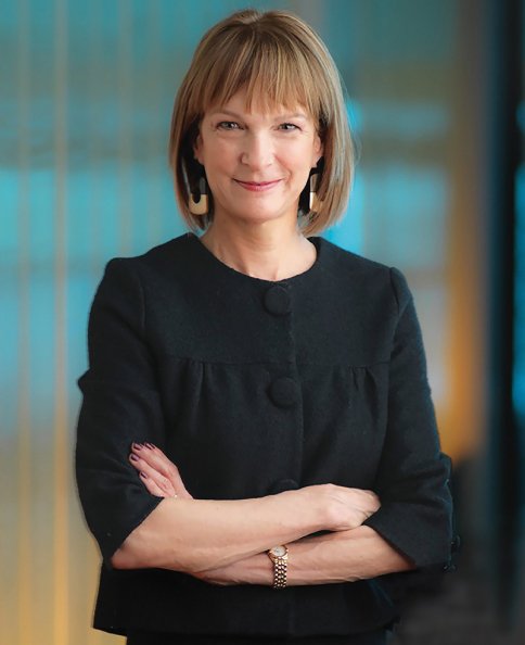 Photo portrait of Patricia E. Harris smiling at the camera