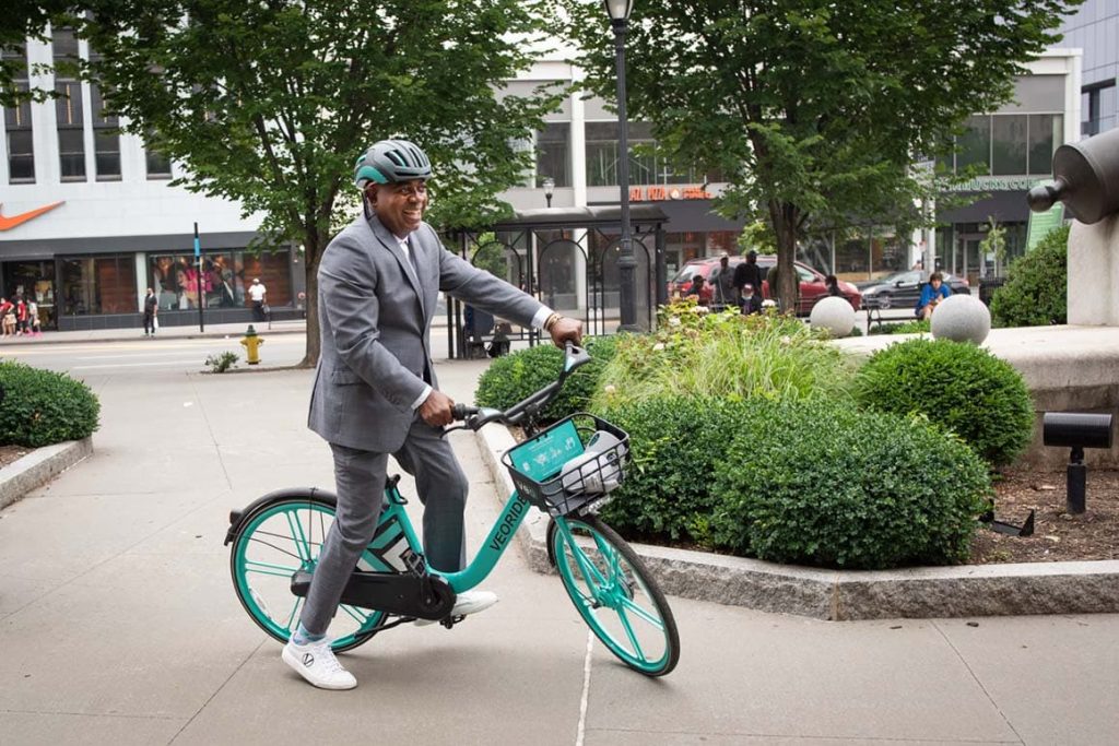 Newark Mayor Ras Baraka rides one of the city’s first shared bicycles.