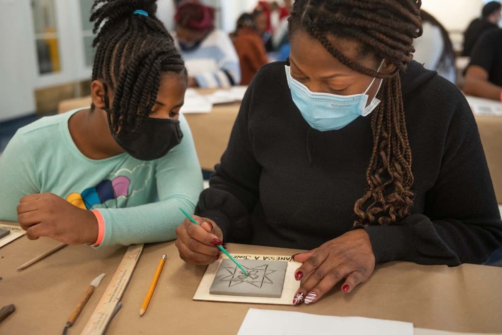 Newark residents create tiles for Harriet Tubman Square.