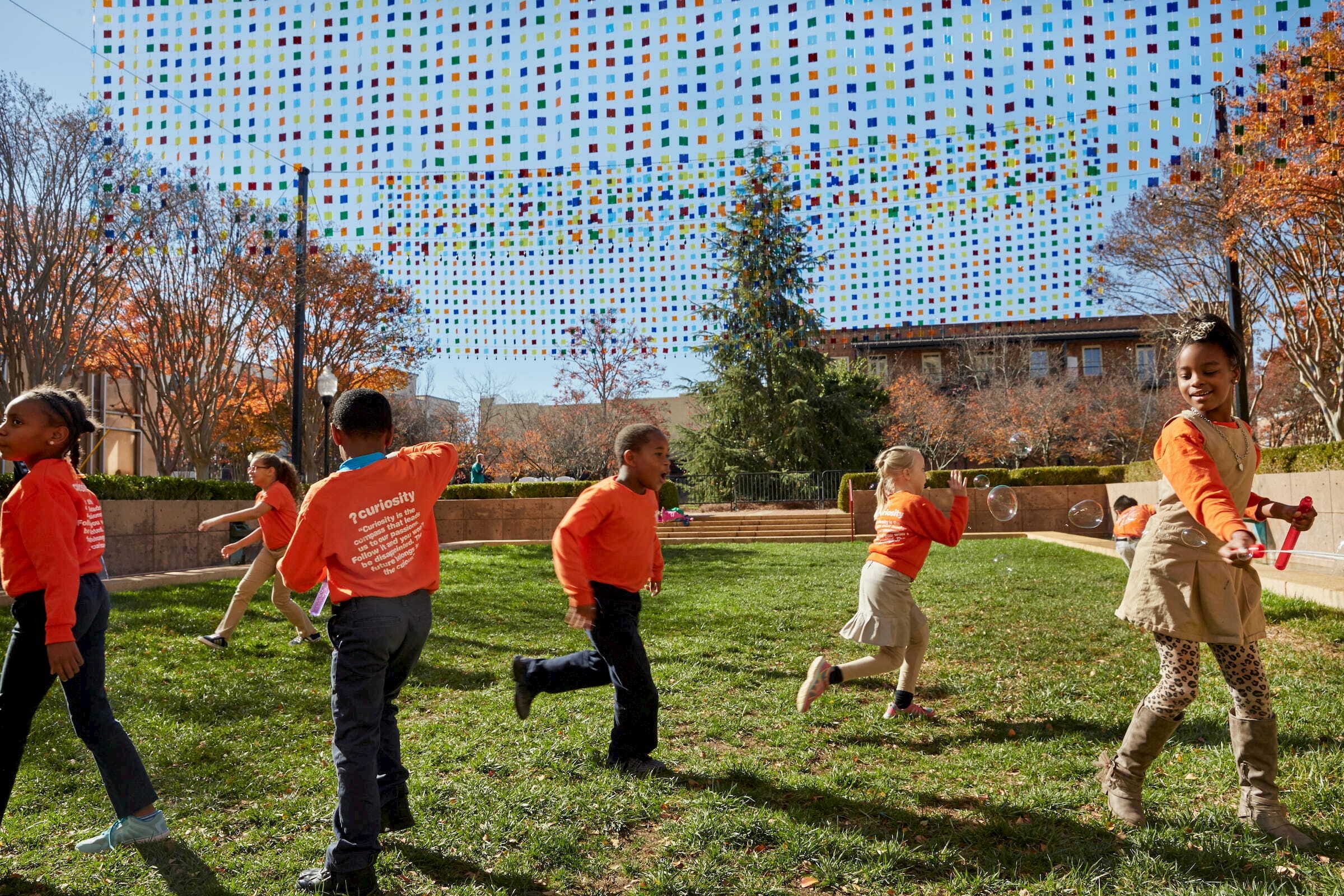 Community members at the opening of artist Erwin Redl's work, "Seeing Spartanburg in a New Light," one of four winning projects for the inaugural Bloomberg Philanthropies Public Art Challenge.