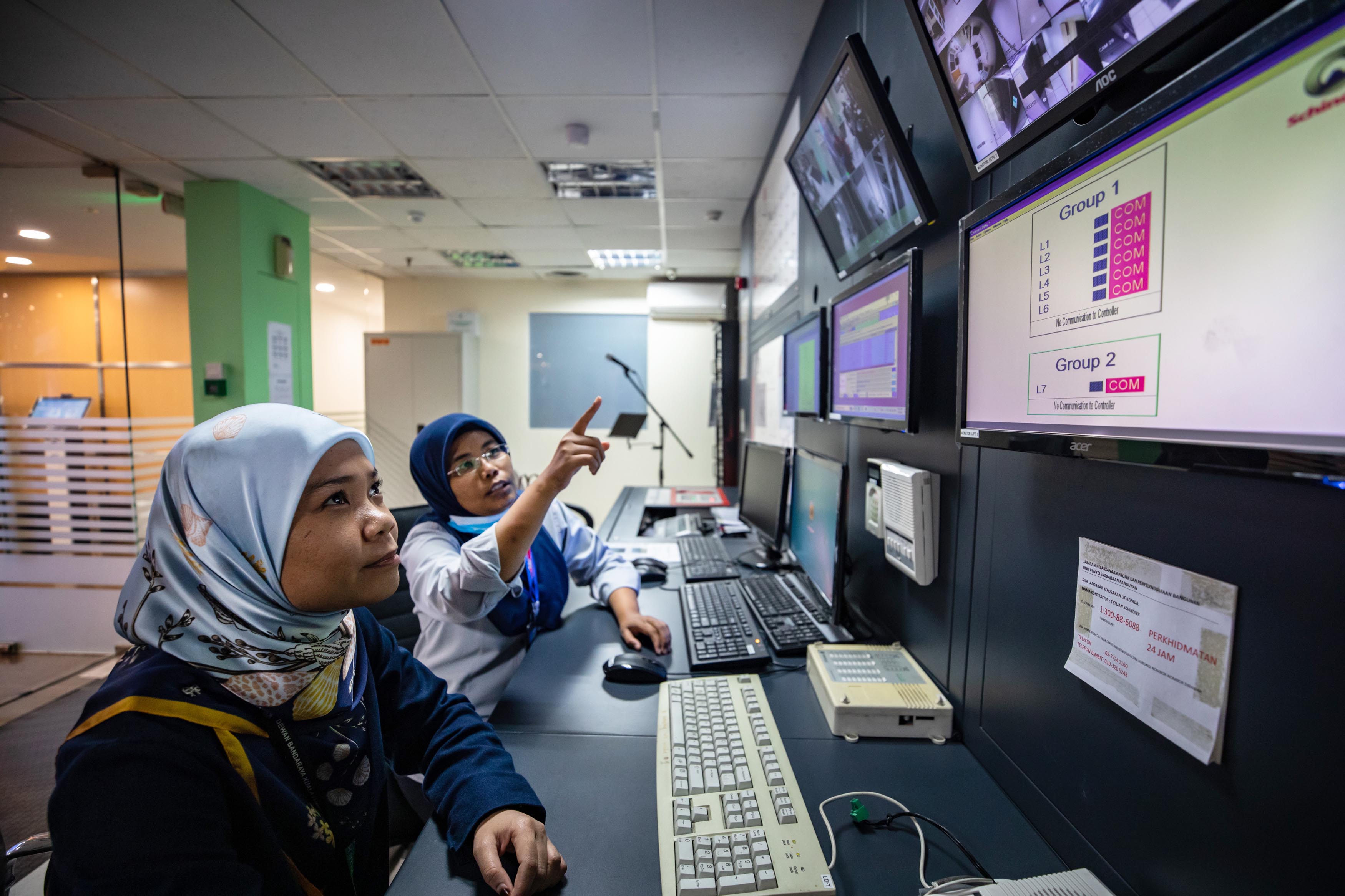 Two women talking about Climate Action in Tokyo and Kuala Lumpur