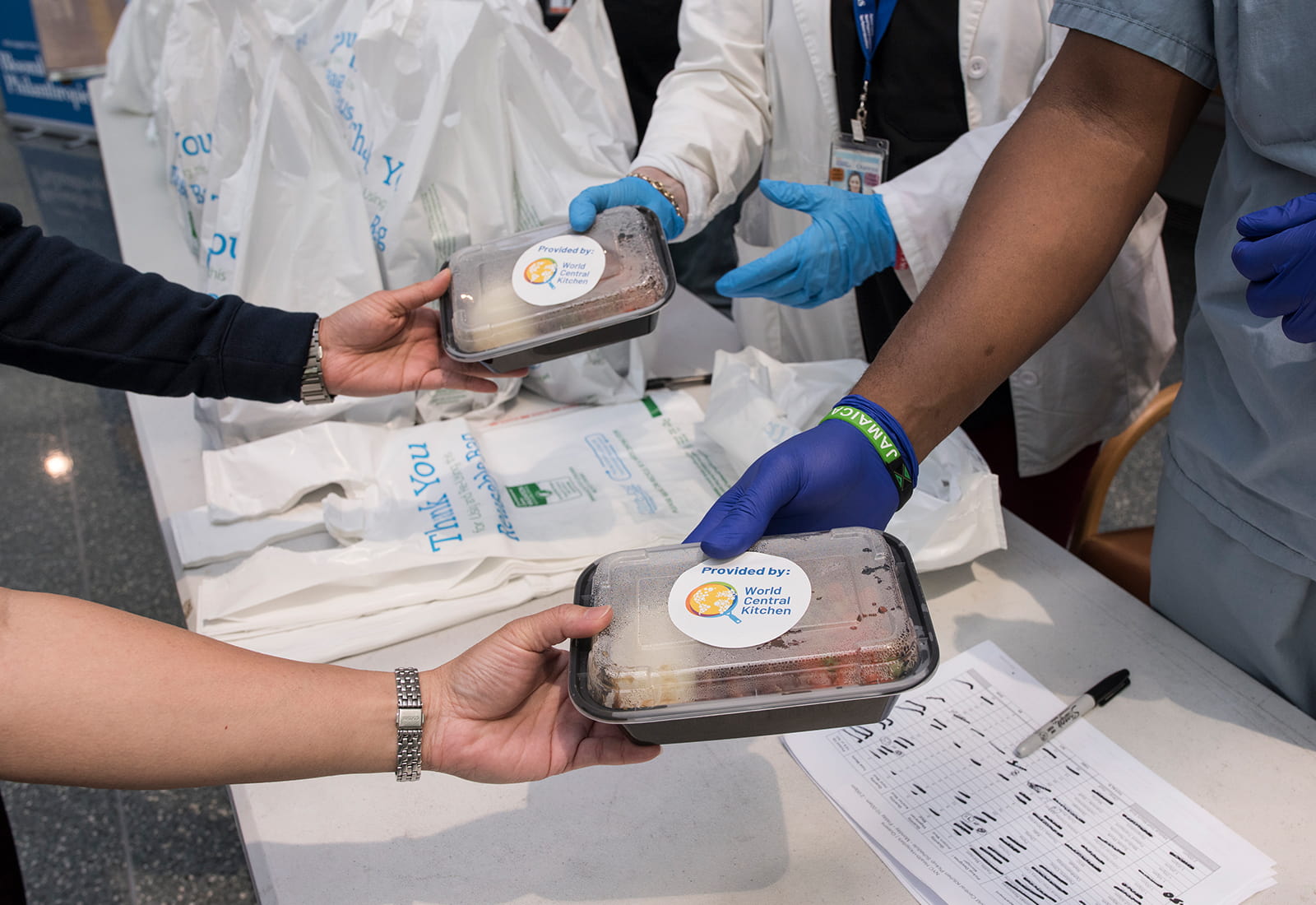 Meals are handed out to frontline workers in Queens.