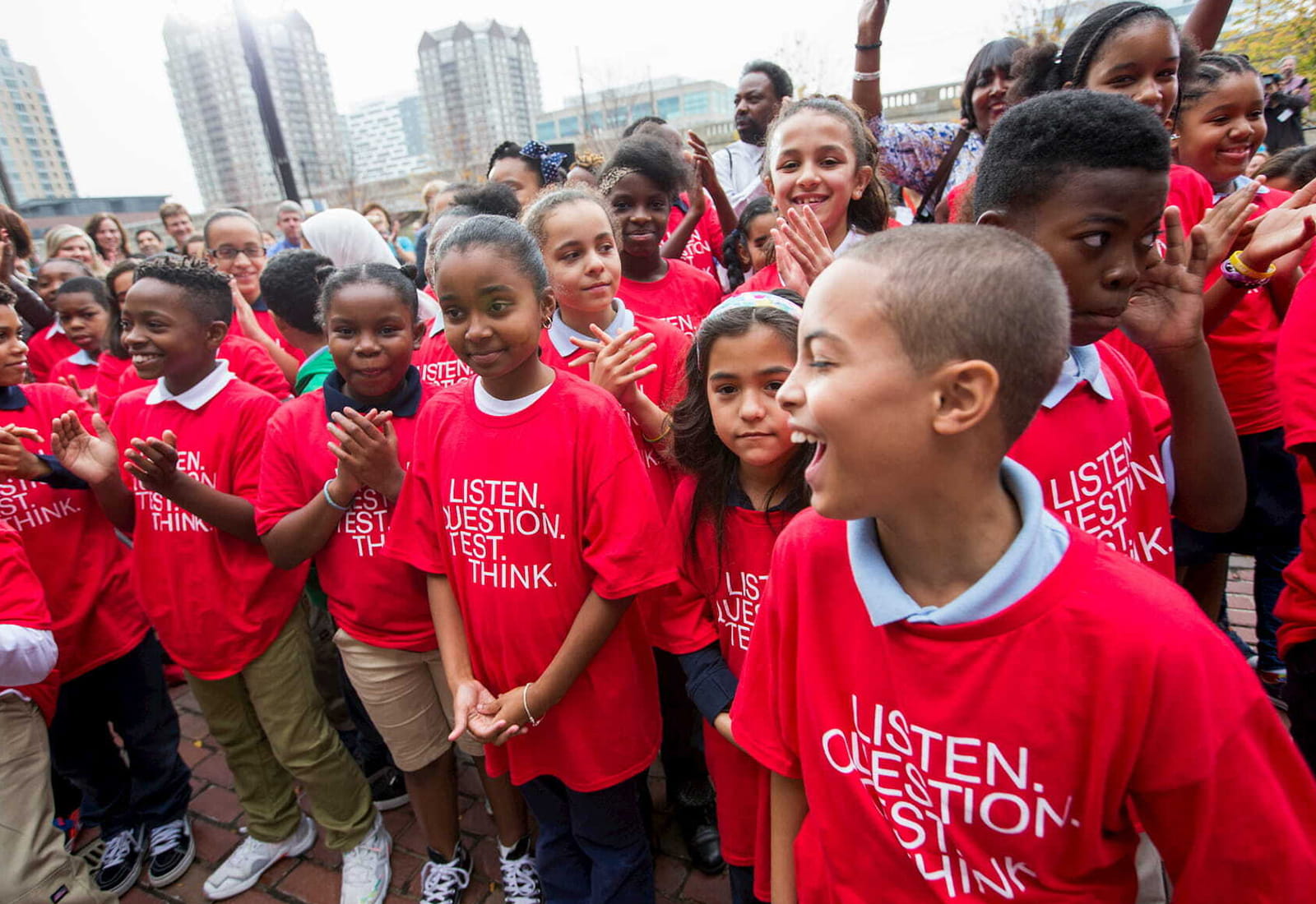 Local students attend the opening of the education division at Boston's Science Museum, the William and Charlotte Bloomberg Science Education Center, named after Mike Bloomberg's late parents.