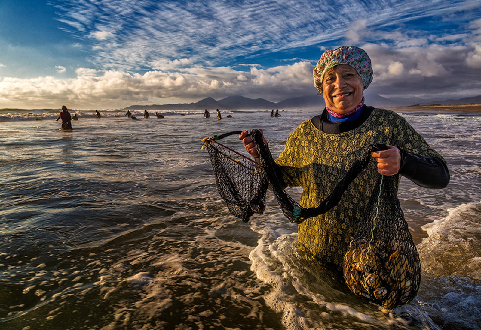 A local woman sustainably fishes in Brazil, ensuring our ocean survives and thrives in the face of climate change.